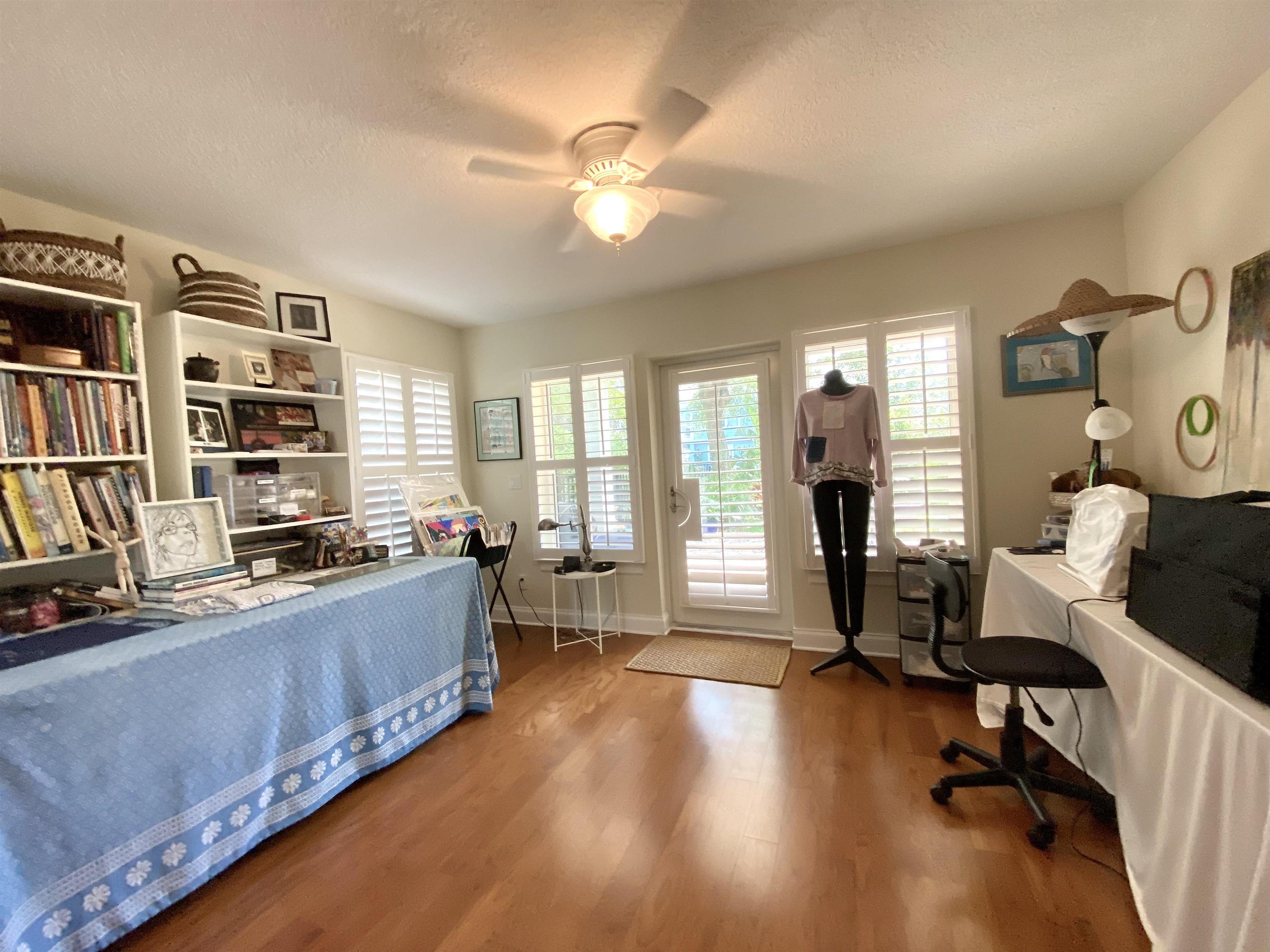176 Sunset Circle North St. Augustine, FL 32080 - Photo 29 of 44 a living room with furniture window and wooden floor