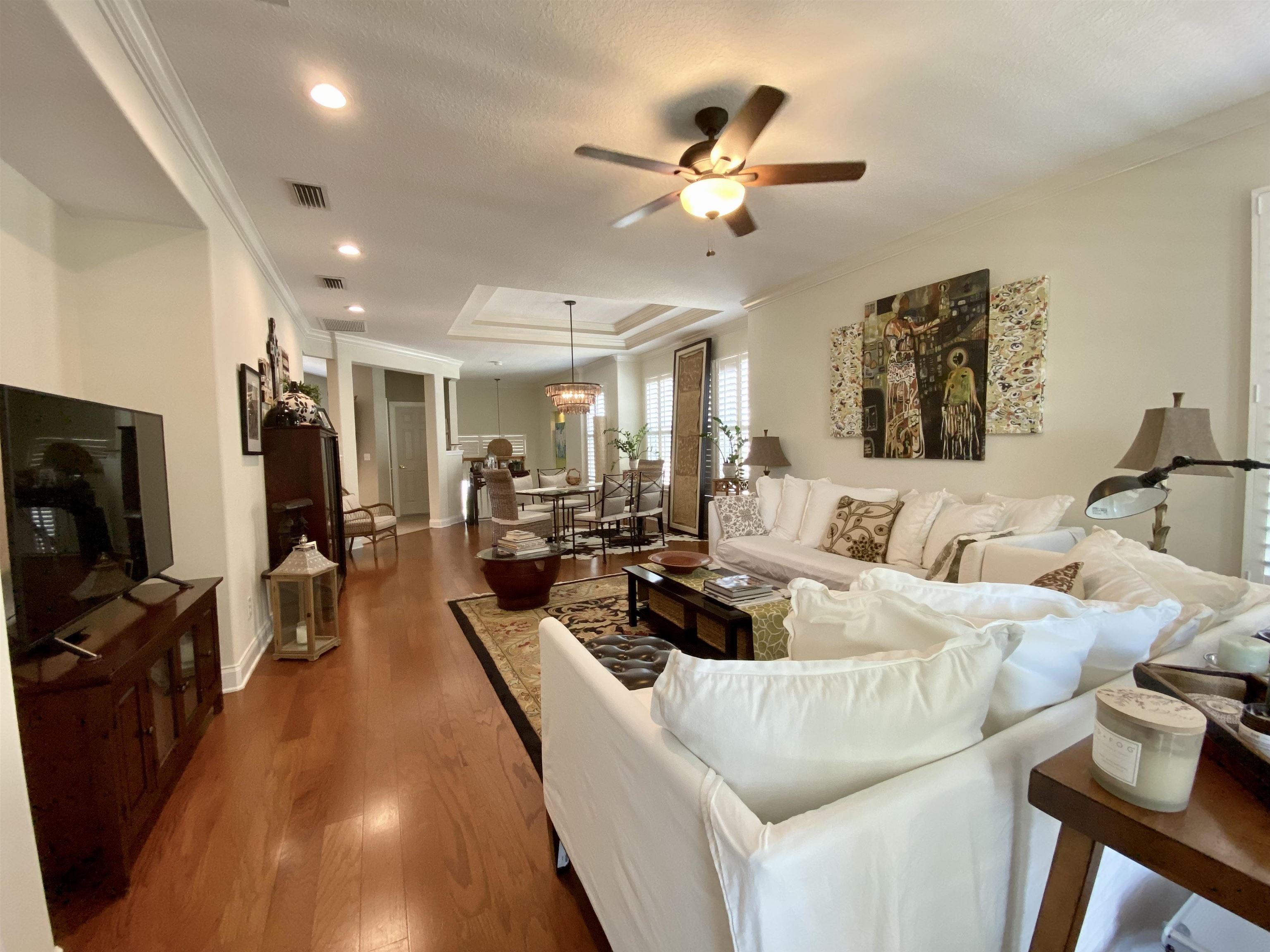 176 Sunset Circle North St. Augustine, FL 32080 - Photo 6 of 44 a living room with furniture and a flat screen tv