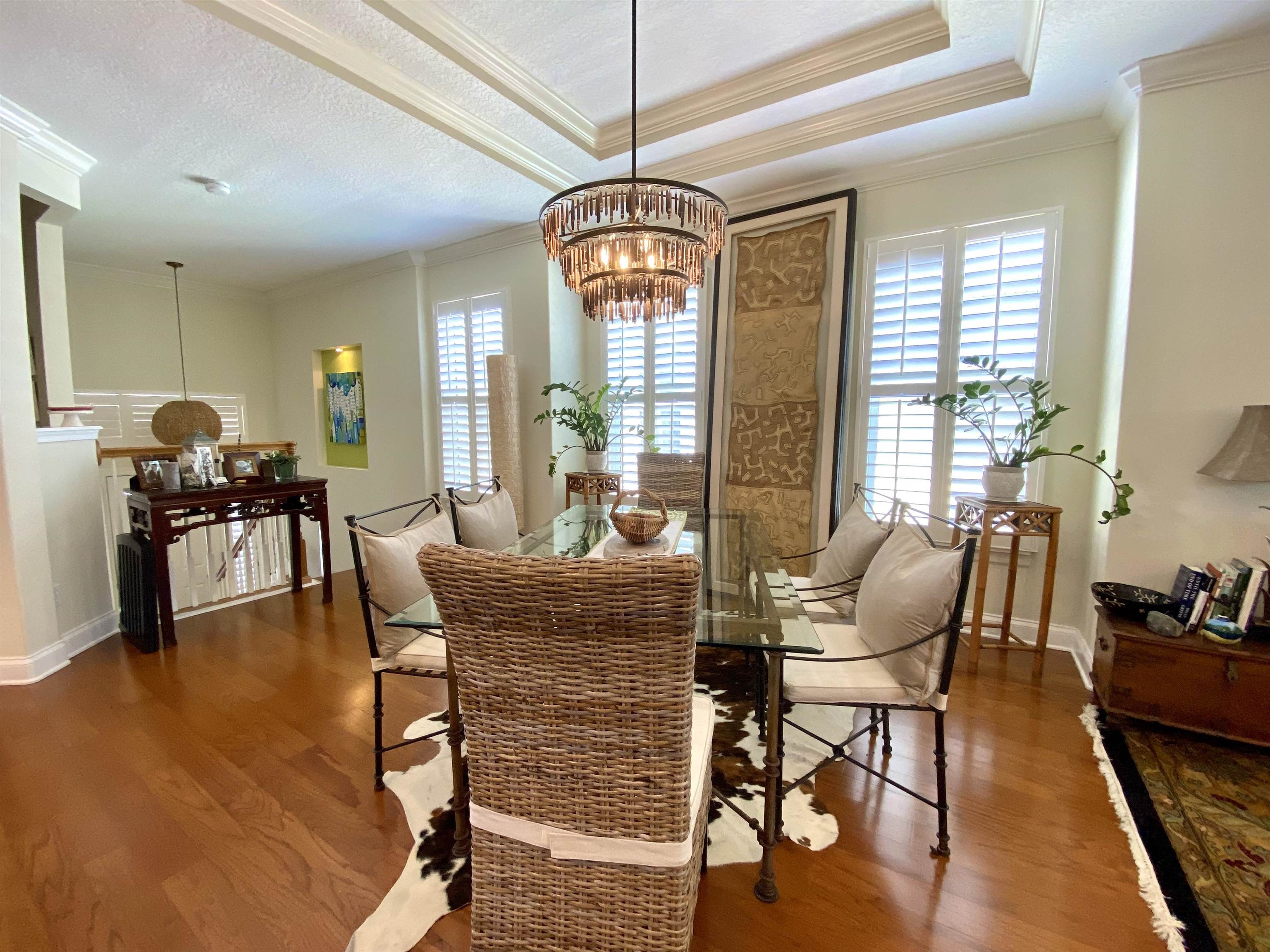 176 Sunset Circle North St. Augustine, FL 32080 - Photo 7 of 44 a living room with furniture and a chandelier