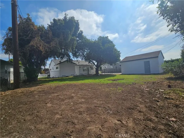 a view of a house with a big yard