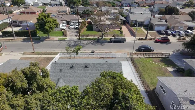 an aerial view of a house with swimming pool