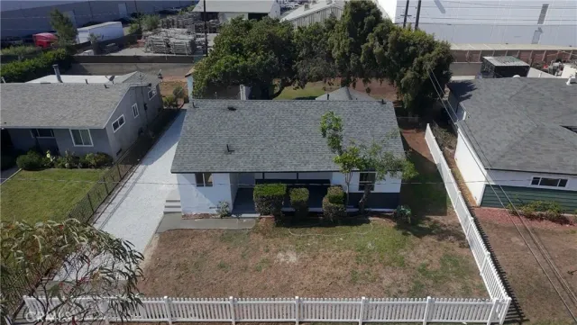 an aerial view of a house with garden