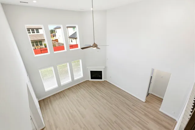 an empty room with closet area