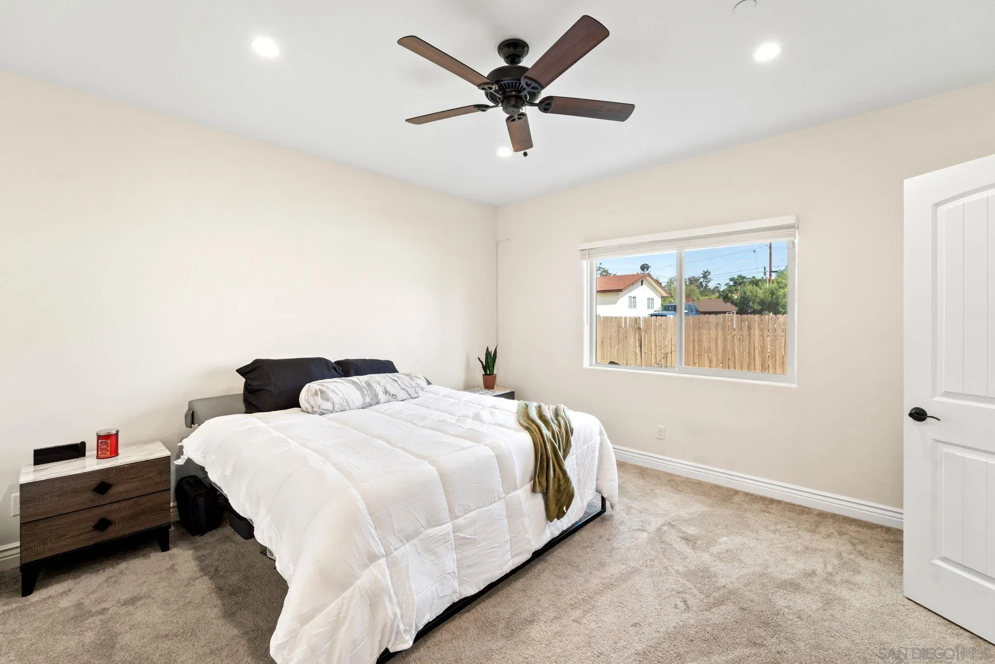 940 Passion Place Ramona, CA 92065 - Photo 13 of 25 a bedroom with a bed and a window