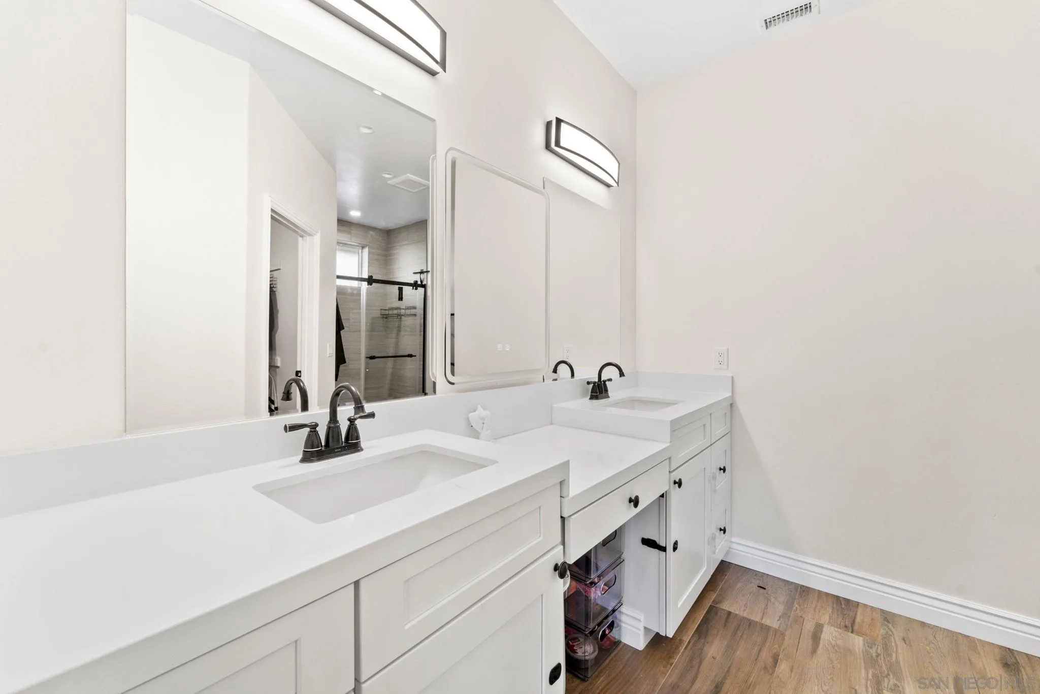 940 Passion Place Ramona, CA 92065 - Photo 15 of 25 a bathroom with a sink and a mirror