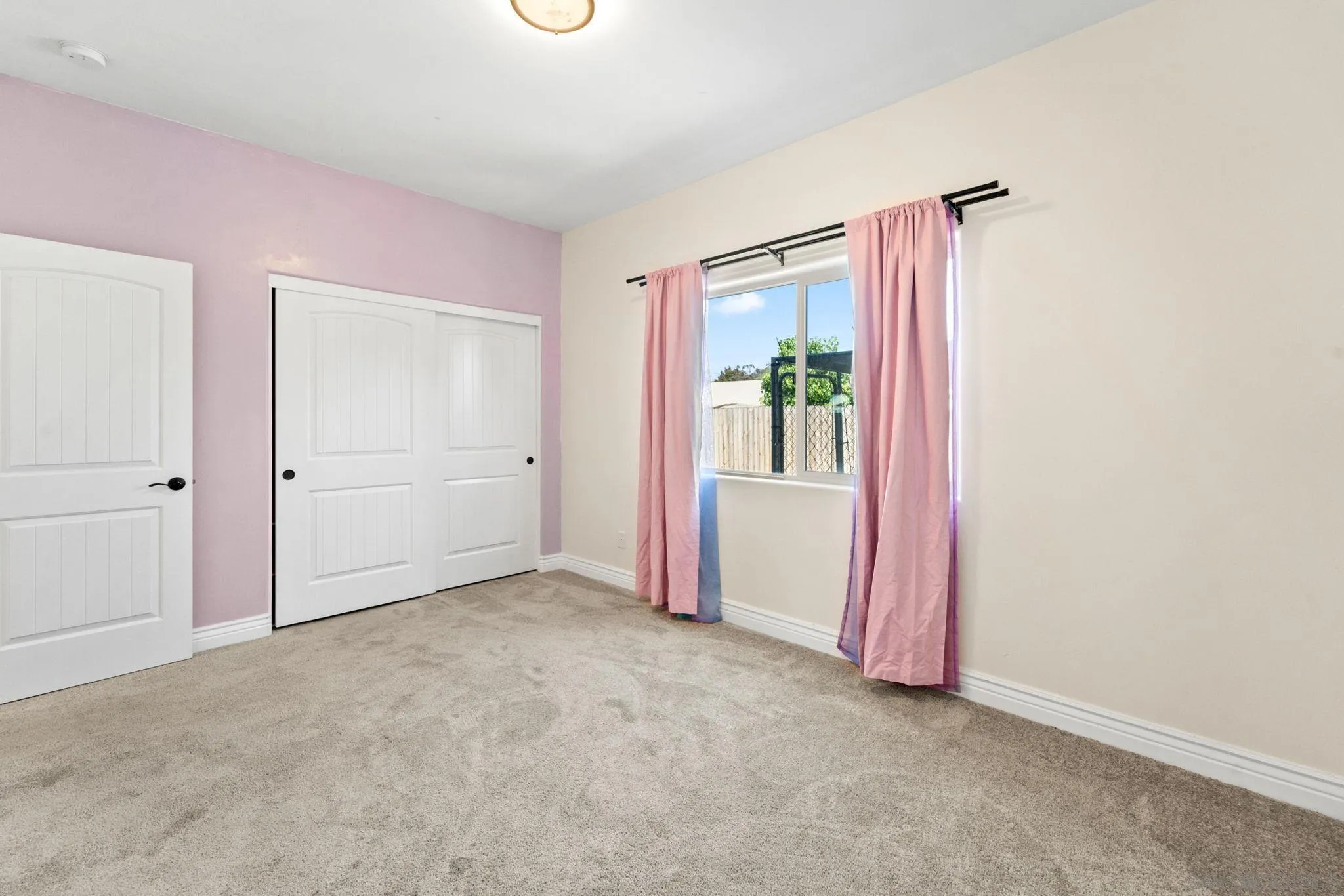 940 Passion Place Ramona, CA 92065 - Photo 19 of 25 an empty room with closet and a window