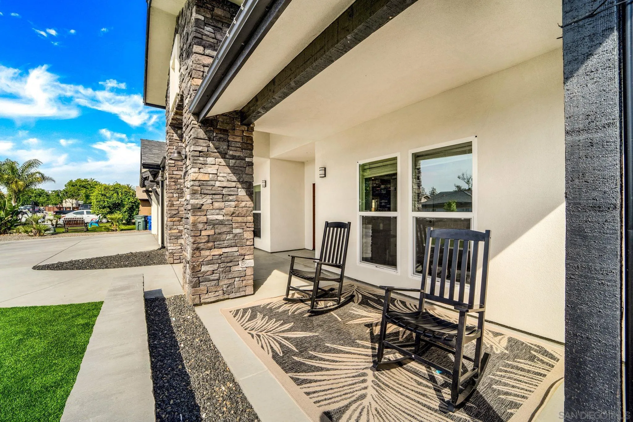 940 Passion Place Ramona, CA 92065 - Photo 2 of 25 a view of balcony with wooden floor and outdoor seating