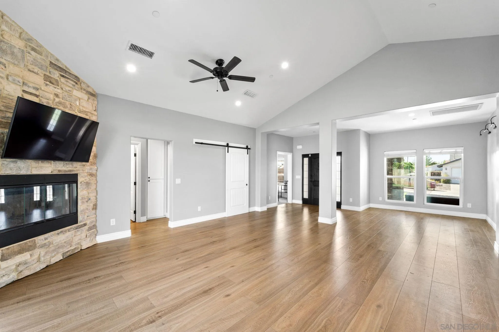 940 Passion Place Ramona, CA 92065 - Photo 4 of 25 a view of an empty room with window and wooden floor