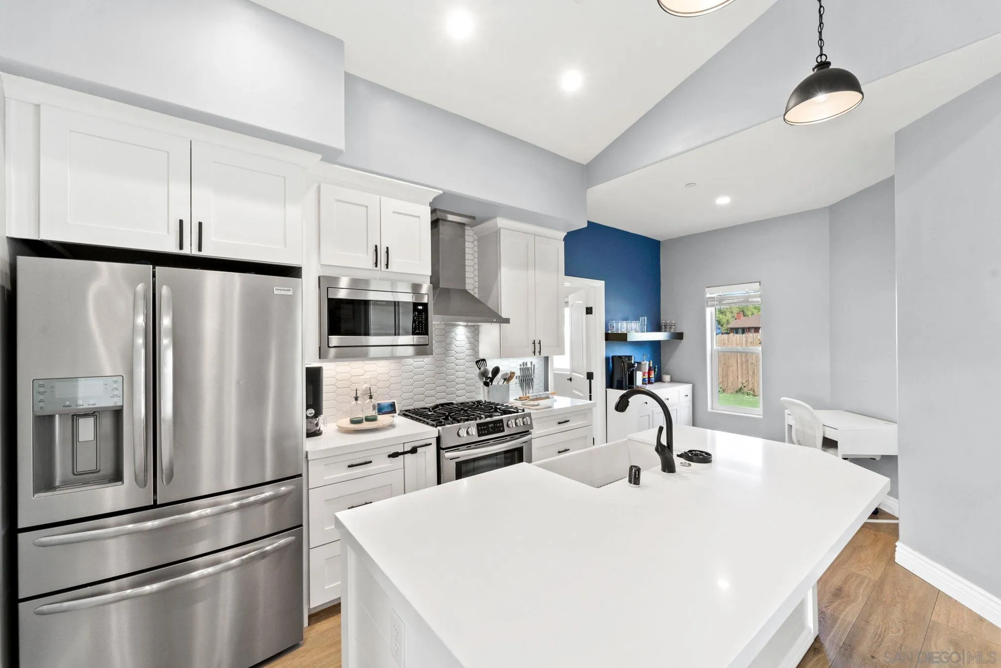 940 Passion Place Ramona, CA 92065 - Photo 9 of 25 a kitchen with stainless steel appliances a refrigerator sink and cabinets
