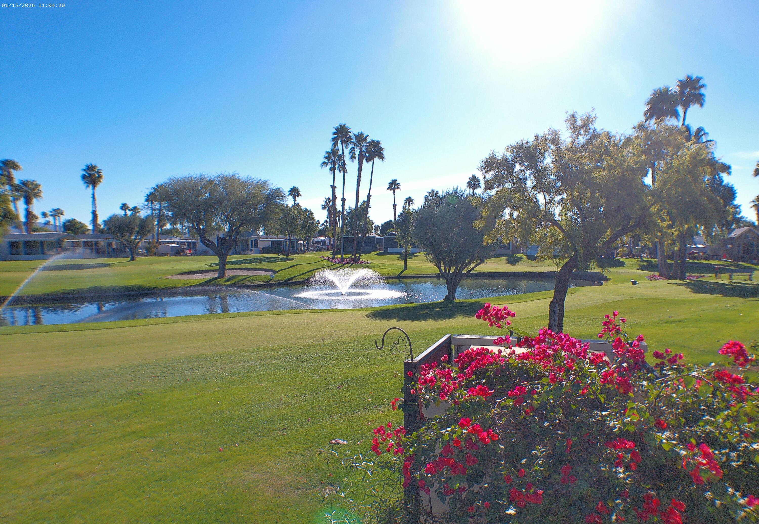 84136 Ave 44, Unit 337 Indio, CA 92203 - Photo 11 of 31 a view of a swimming pool with an outdoor space and seating area