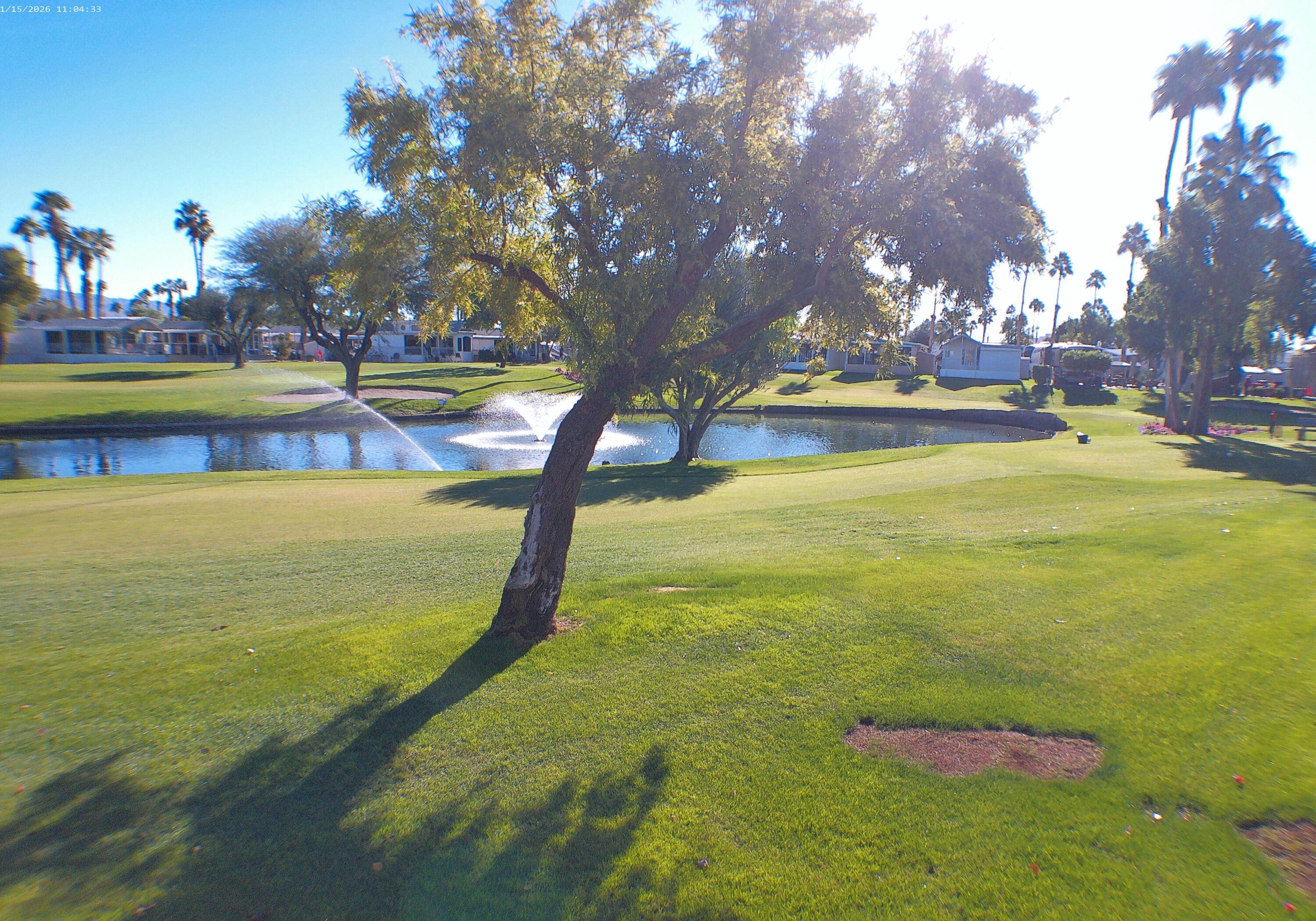 84136 Ave 44, Unit 337 Indio, CA 92203 - Photo 12 of 31 a view of swimming pool with an outdoor space and seating area