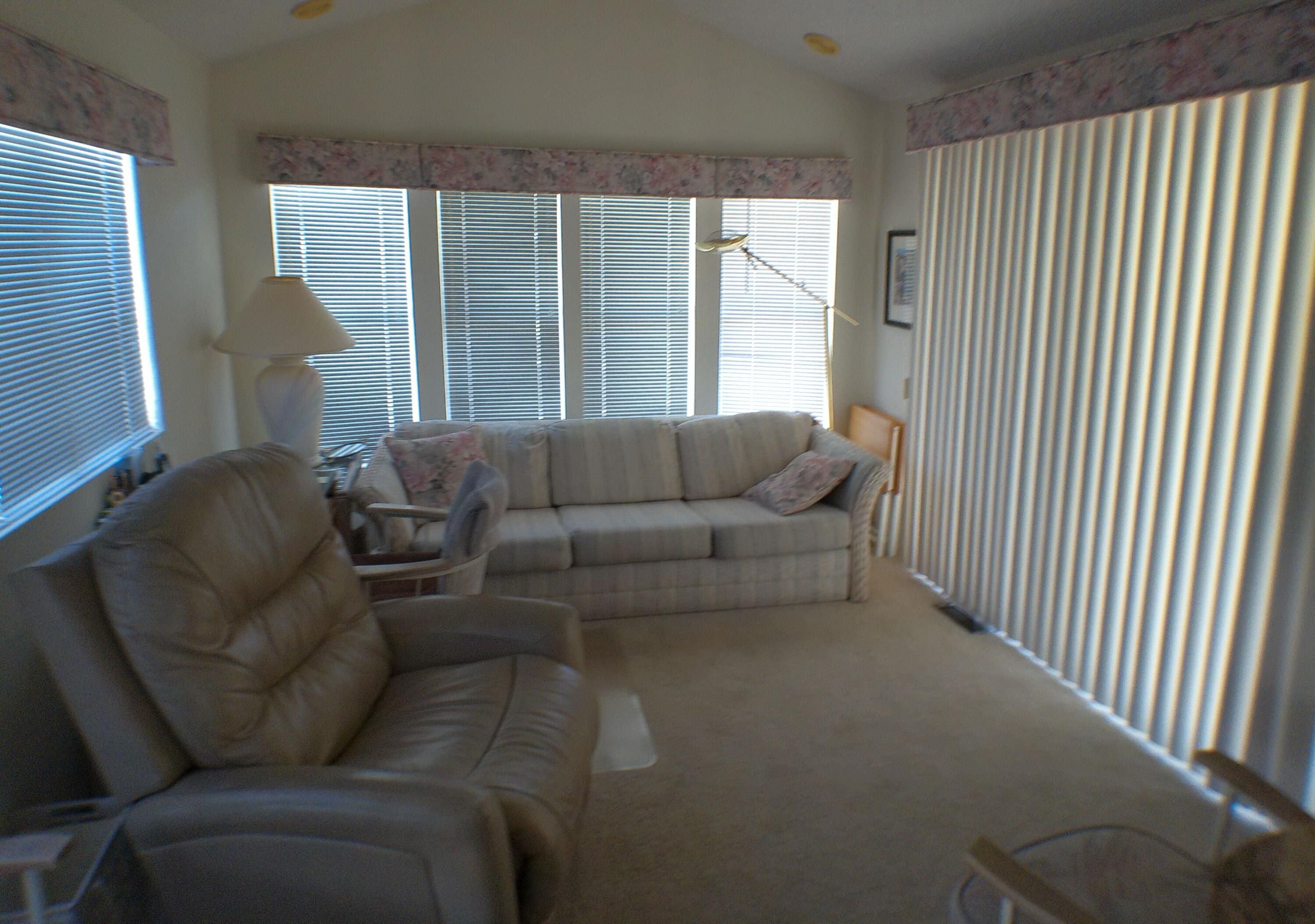 84136 Ave 44, Unit 337 Indio, CA 92203 - Photo 13 of 31 a living room with furniture and a large window