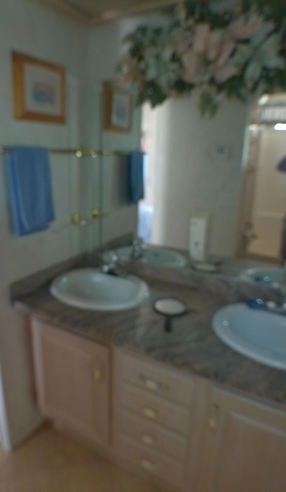 84136 Ave 44, Unit 337 Indio, CA 92203 - Photo 22 of 31 a bathroom with a sink and toilet