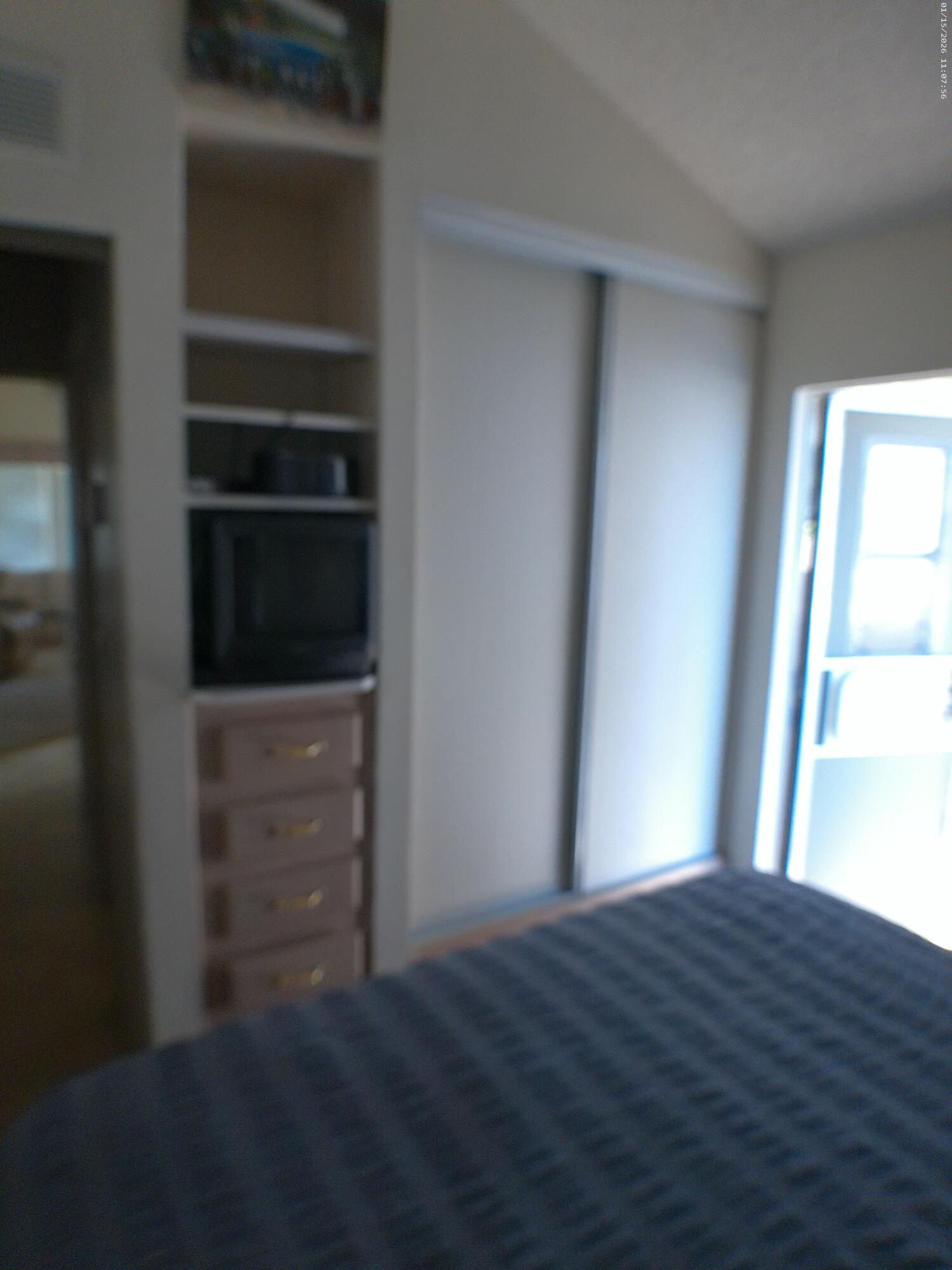 84136 Ave 44, Unit 337 Indio, CA 92203 - Photo 27 of 31 a view of empty room with closet and window