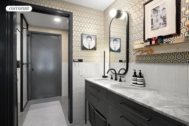 a bathroom with a sink and a mirror