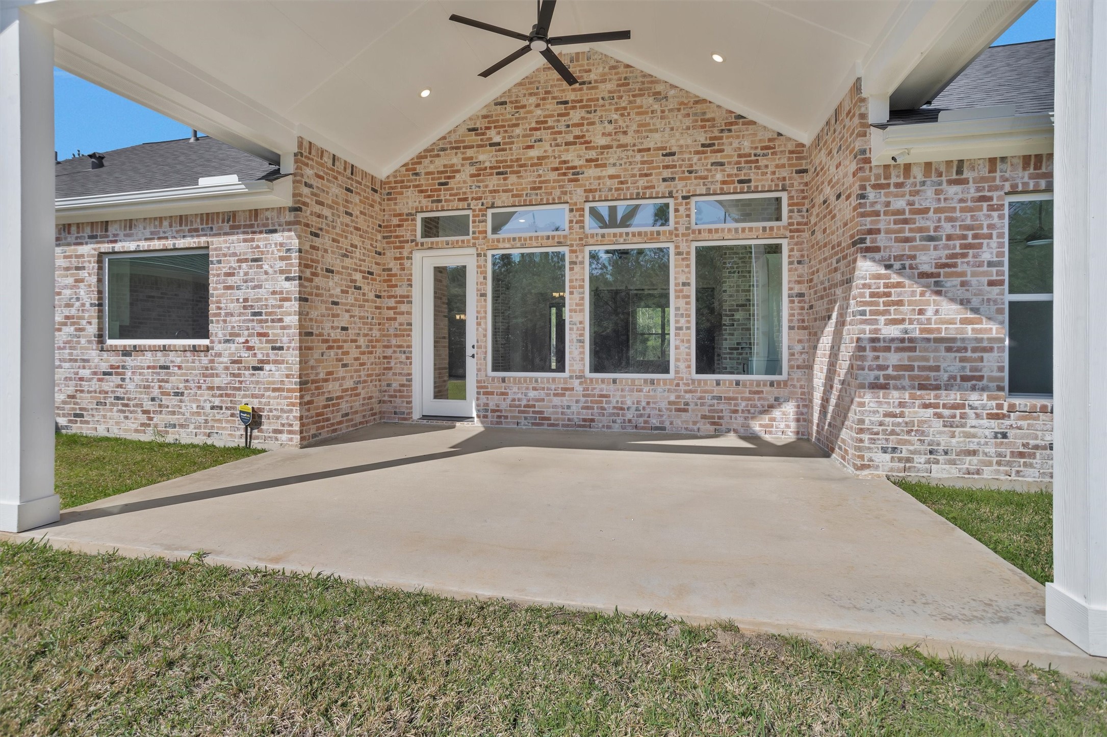 12744 Oak Barrel Road Willis, TX 77378 - Photo 40 of 50 Overlooking the spacious backyard, the patio creates a seamless connection between indoor and outdoor living — ideal for hosting gatherings, enjoying quiet evenings, or designing the backyard retreat you’ve always envisioned.