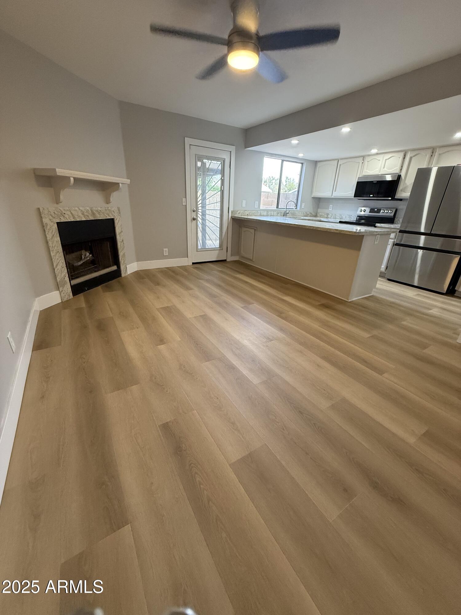 170 East Guadalupe Road, Unit 173 Gilbert, AZ 85234 - Photo 6 of 51 living room 2