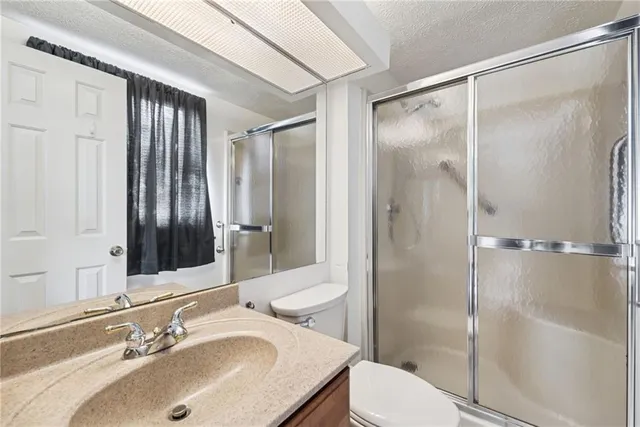 a living room with furniture a window and a fireplace