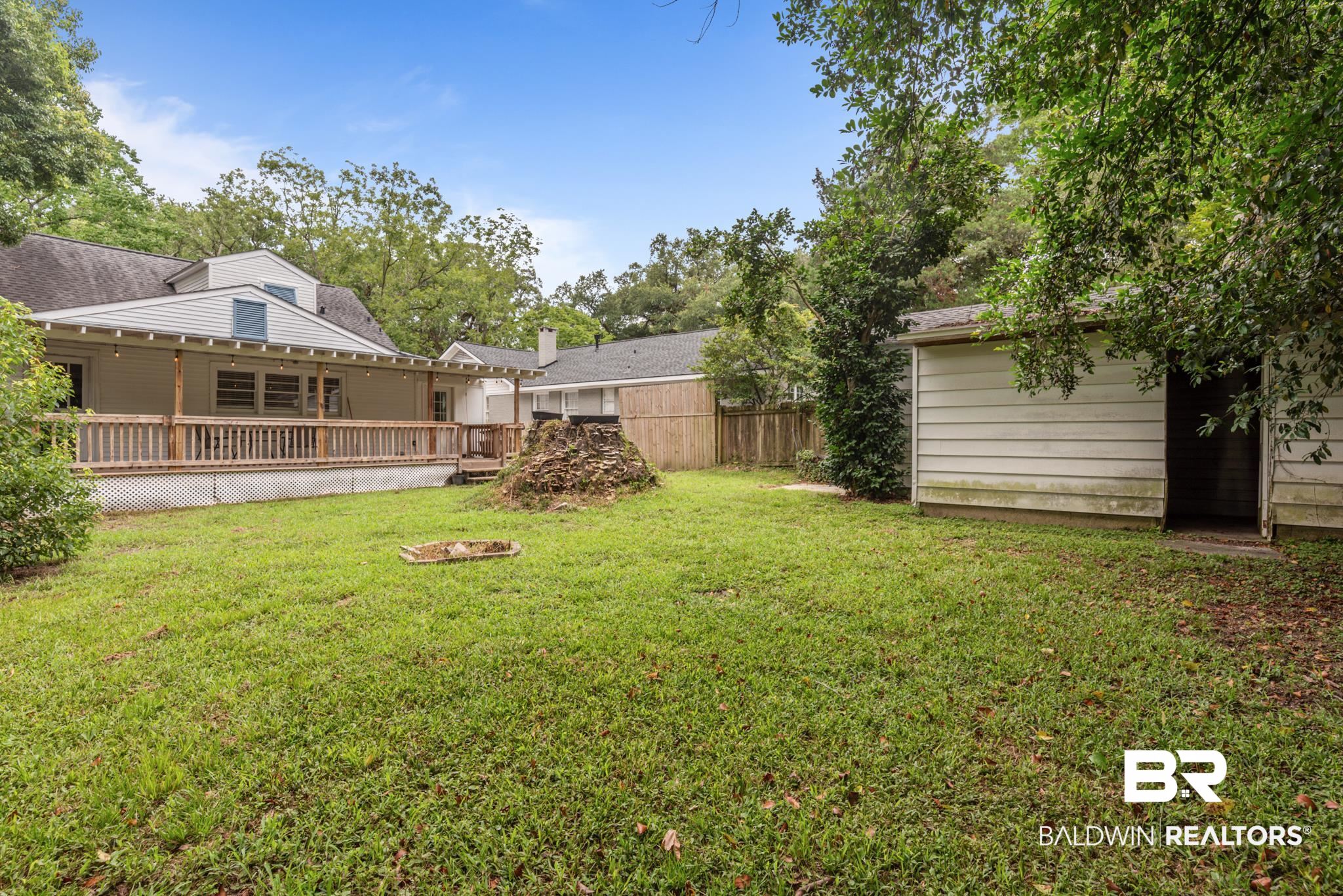 114 Crenshaw Street Mobile, AL 36606 - Photo 48 of 49 View of yard featuring a deck