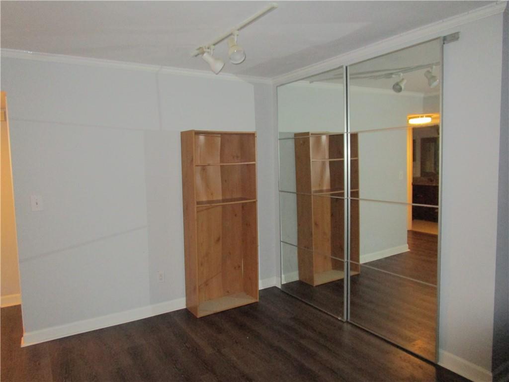 4003 Wingate Way Sandy Springs, GA 30350 - Photo 7 of 29 a view of empty room with wooden floor and window