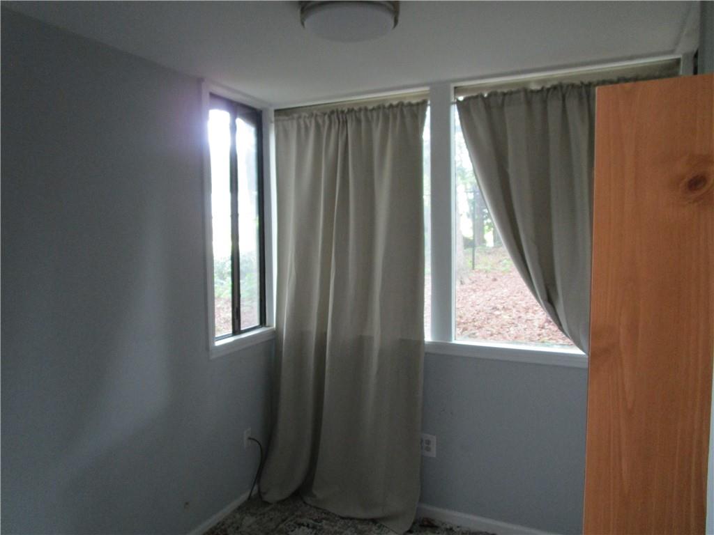 4003 Wingate Way Sandy Springs, GA 30350 - Photo 8 of 29 an empty room with windows
