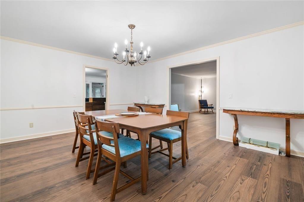 286 Hilton Way Canton, GA 30114 - Photo 12 of 59 a view of a dining room with furniture and wooden floor