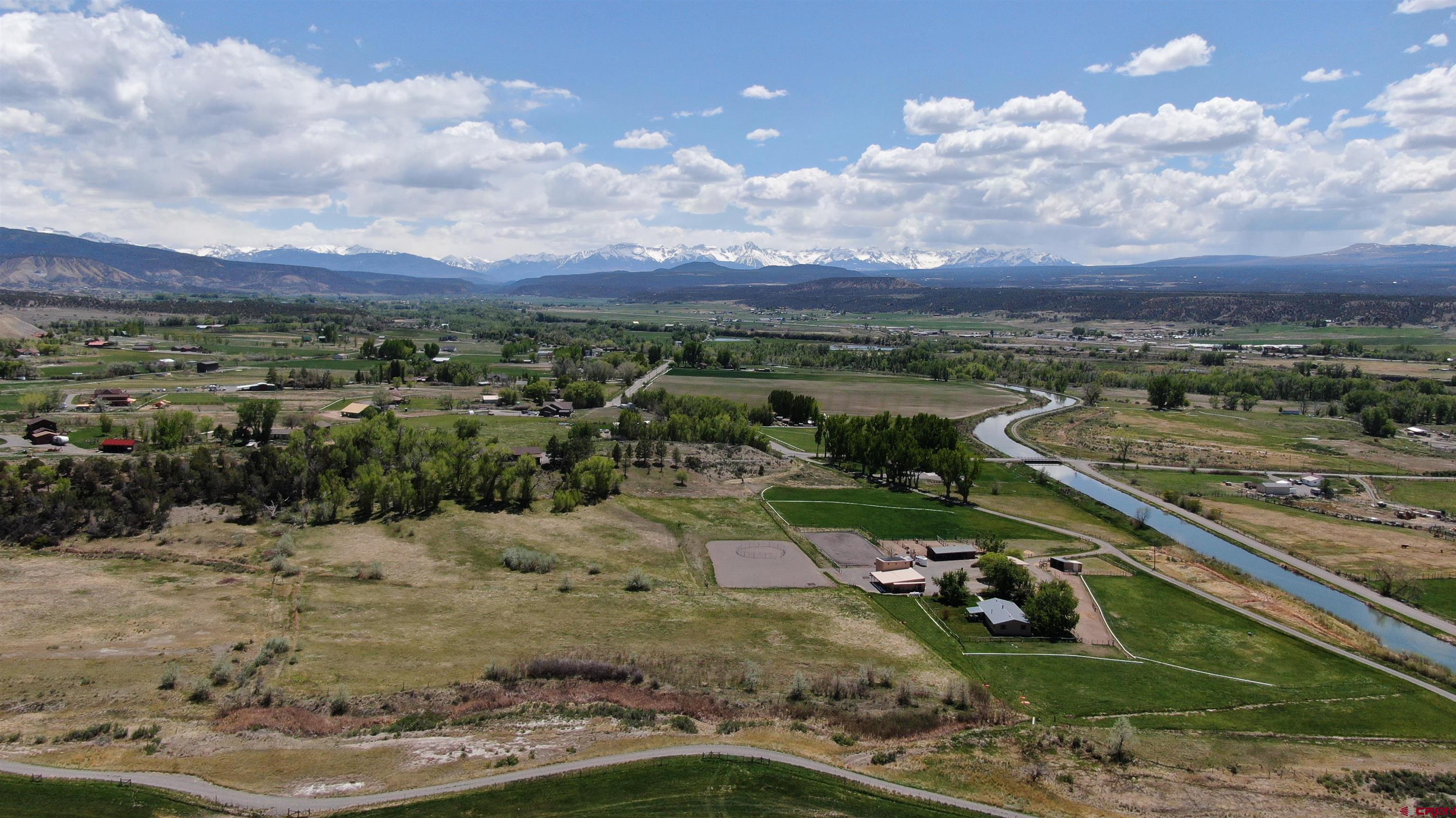 21446 Uncompahgre Road Montrose, CO 81403 - Photo 1 of 40 a view of a town with big yard