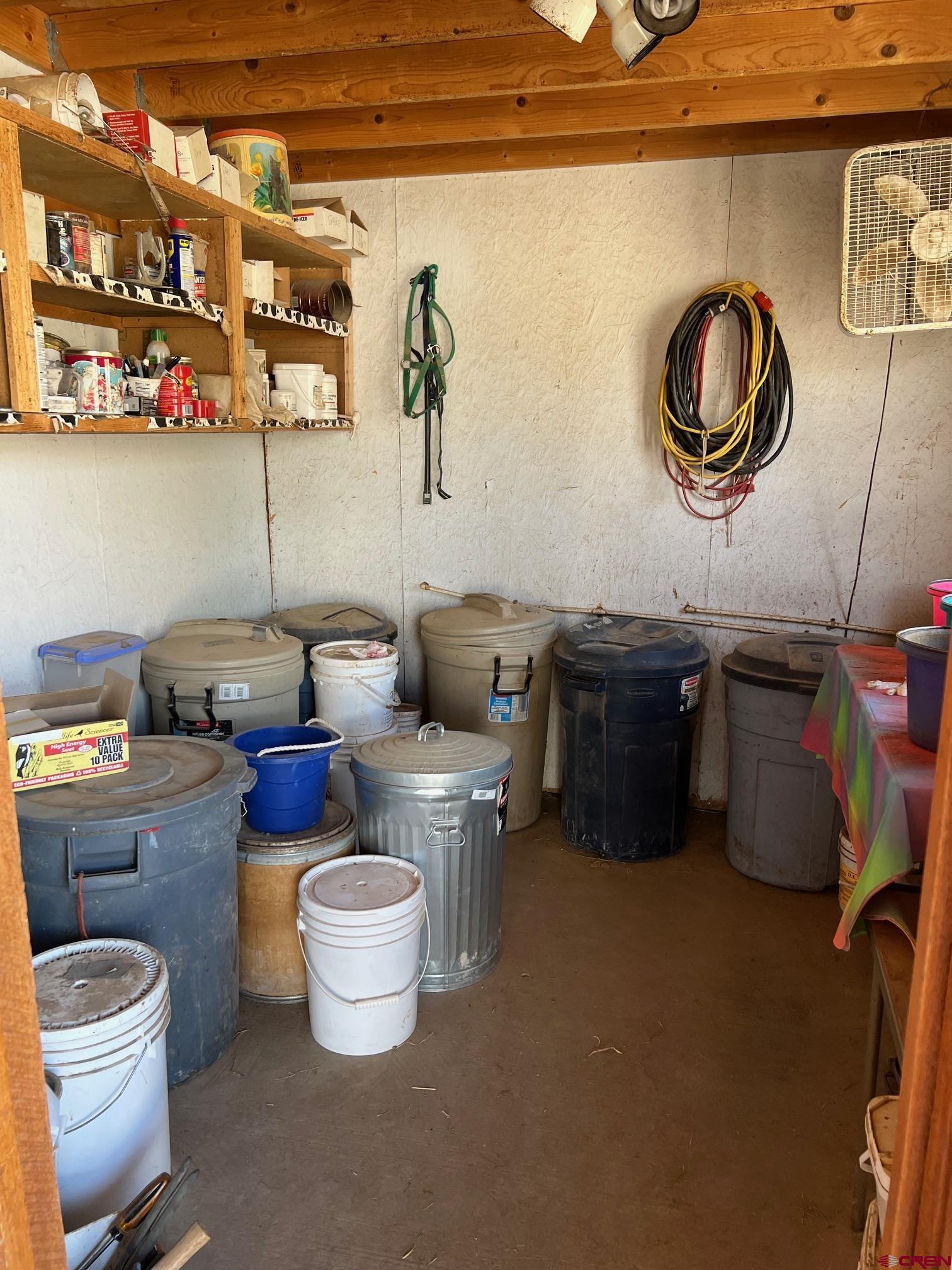 21446 Uncompahgre Road Montrose, CO 81403 - Photo 30 of 40 a kitchen with a sink and a stove