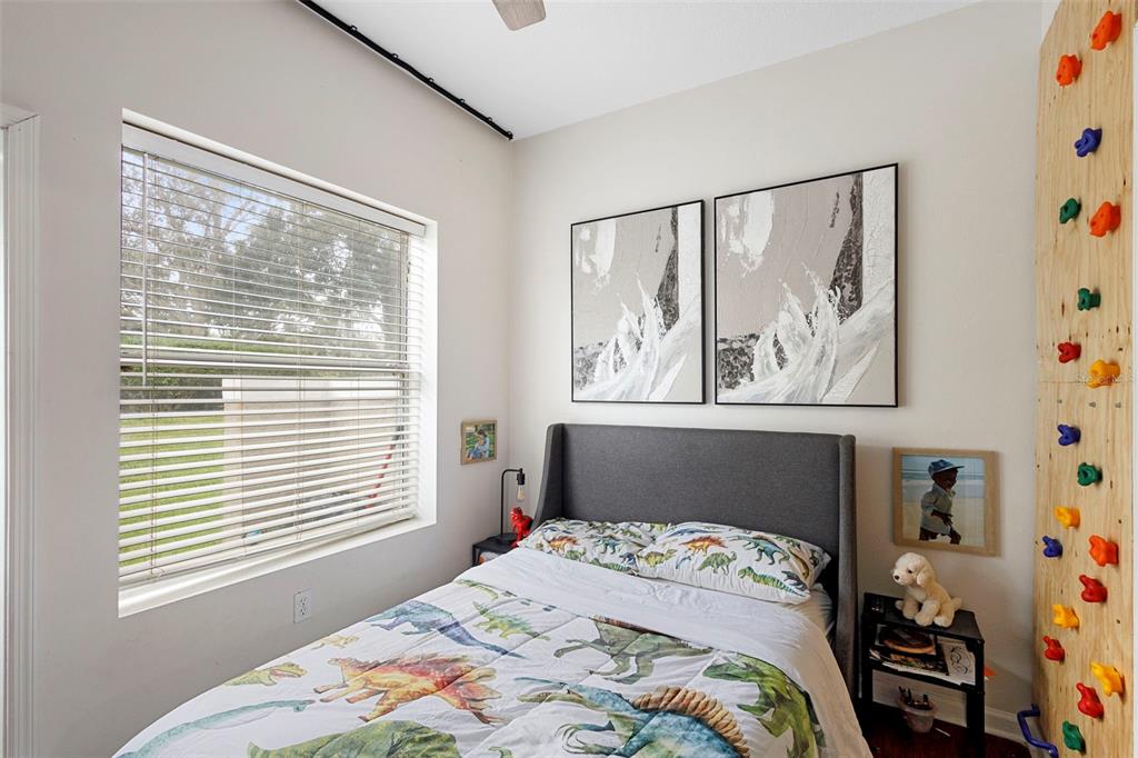 3111 River Branch Circle Kissimmee, FL 34741 - Photo 26 of 39 a bedroom with a bed and a window