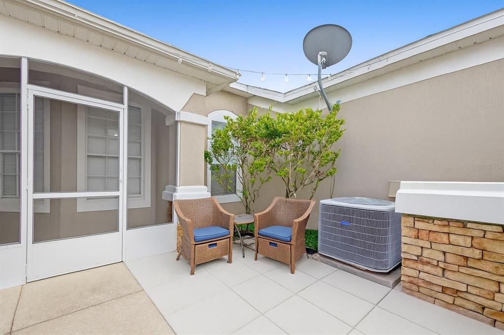 3111 River Branch Circle Kissimmee, FL 34741 - Photo 3 of 39 a outdoor seating space with furniture