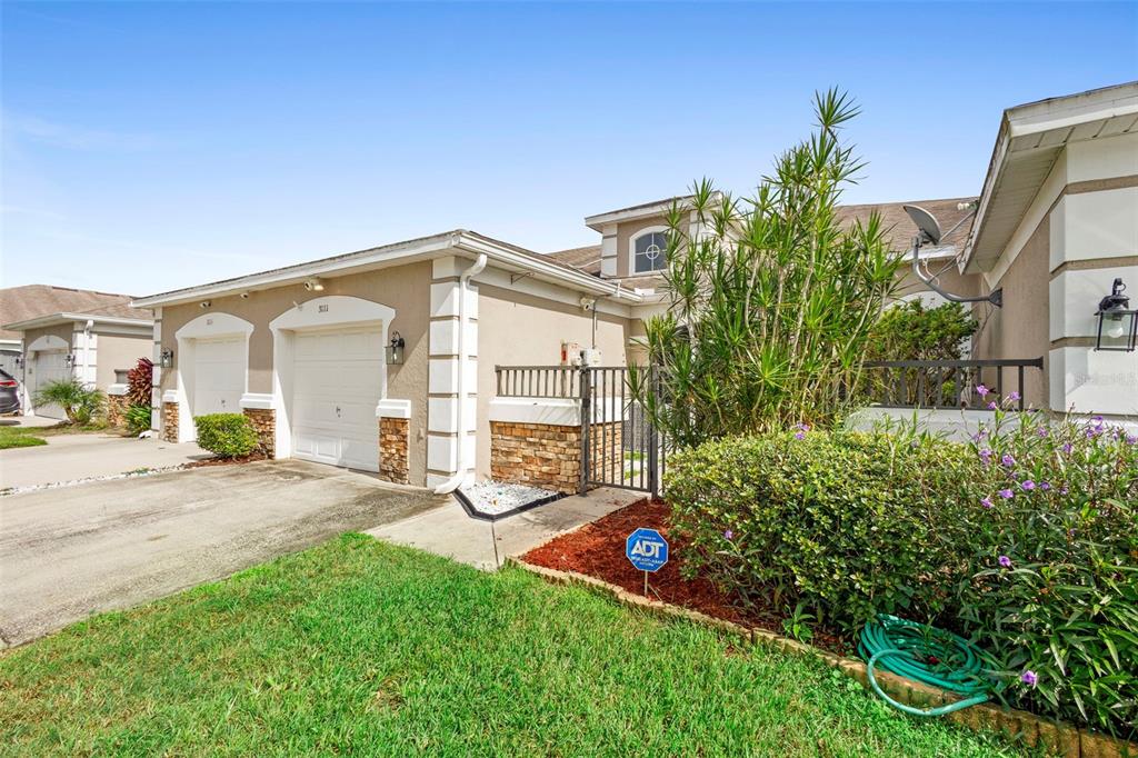 3111 River Branch Circle Kissimmee, FL 34741 - Photo 31 of 39 a view of a house with backyard and porch