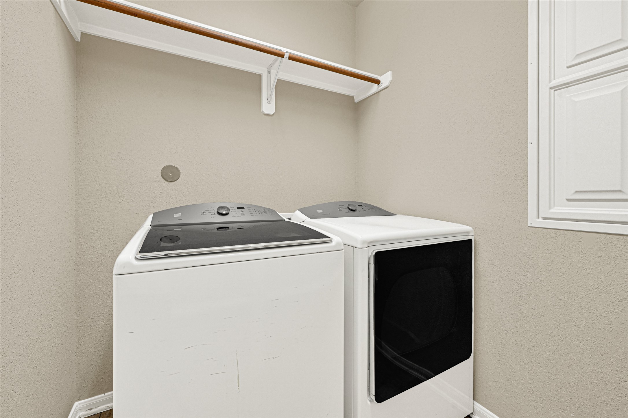 16415 Lapis River Drive Spring, TX 77379 - Photo 11 of 20 a utility room with dryer and washer