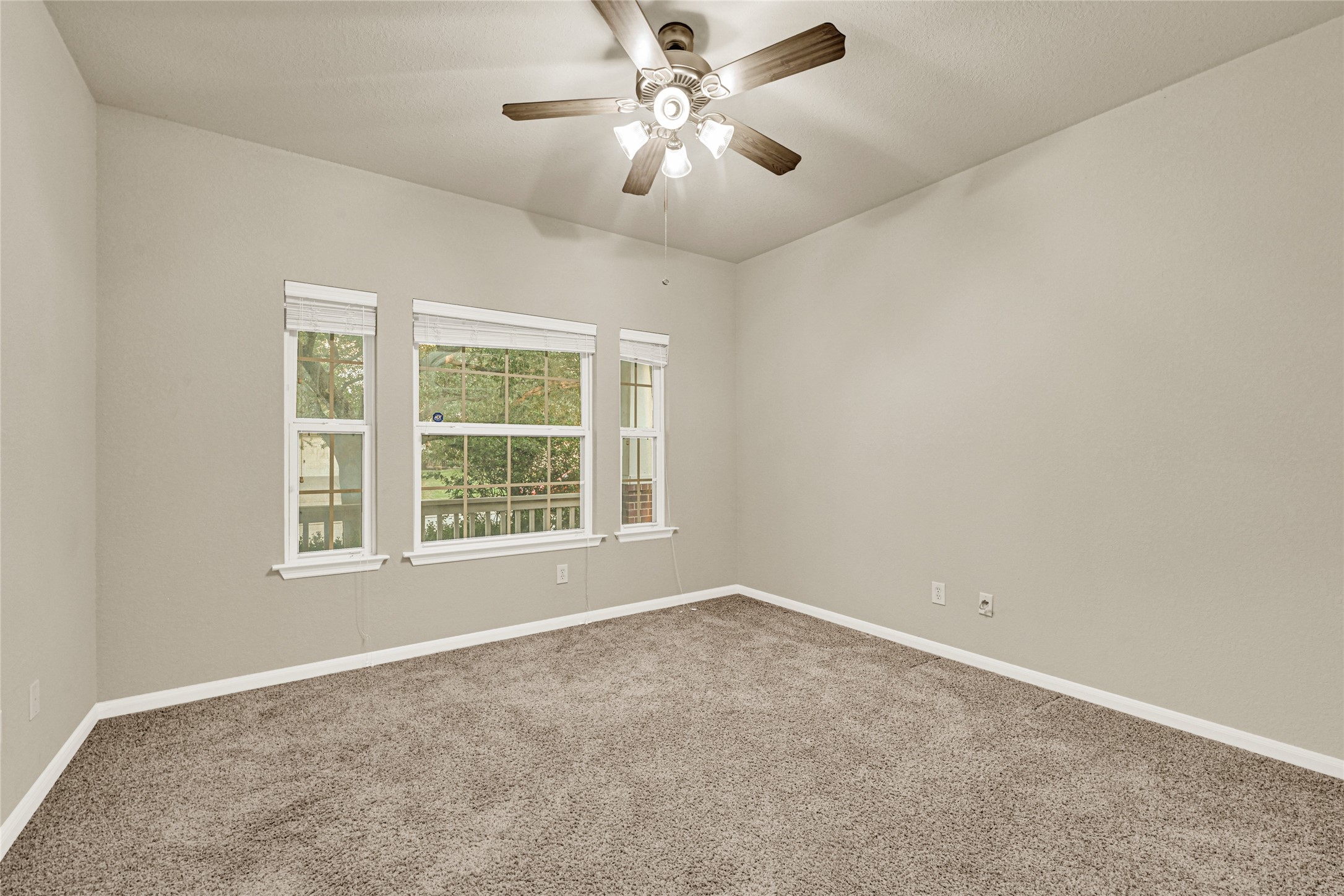 16415 Lapis River Drive Spring, TX 77379 - Photo 18 of 20 a view of an empty room with a window