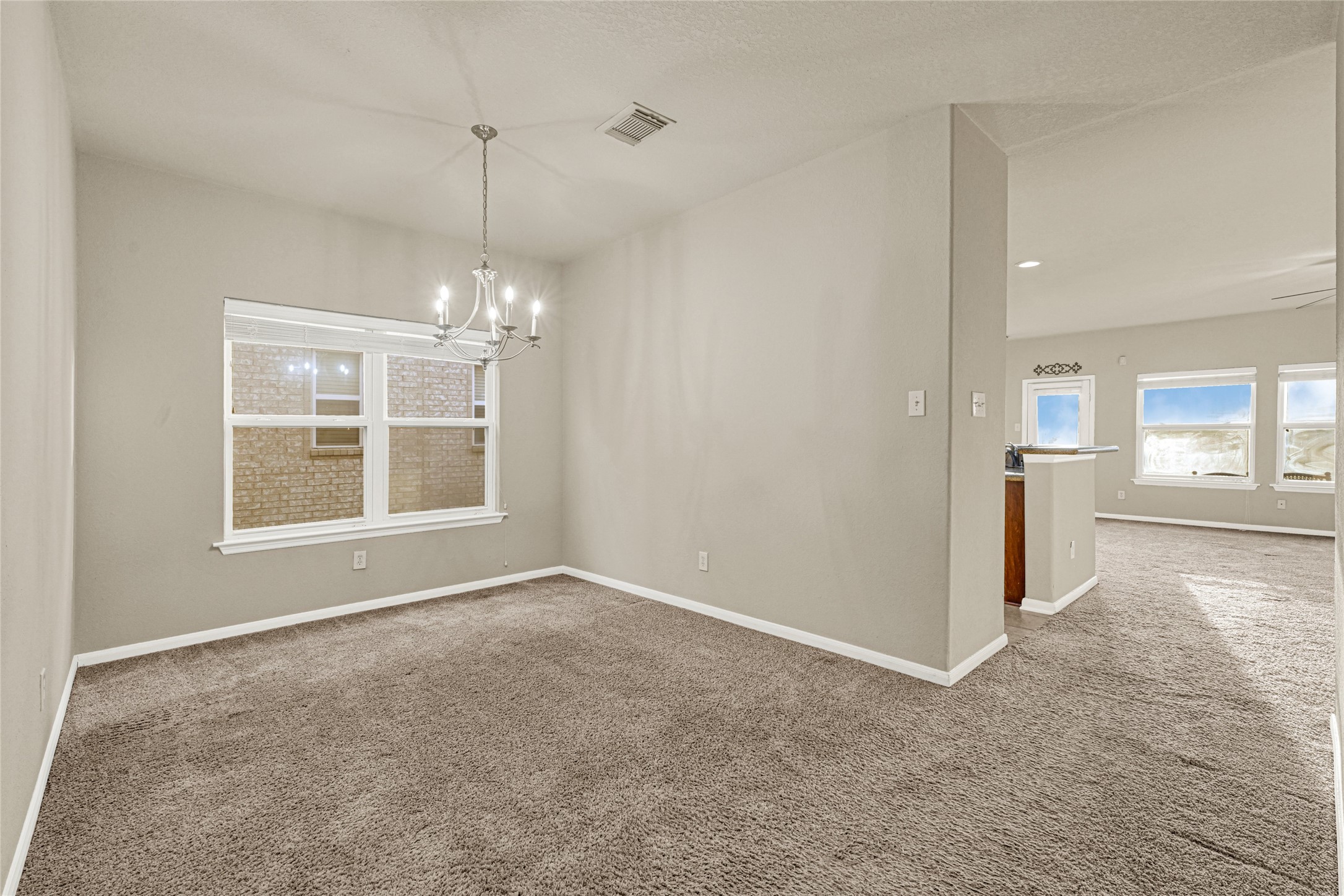 16415 Lapis River Drive Spring, TX 77379 - Photo 3 of 20 a view of an empty room with a window