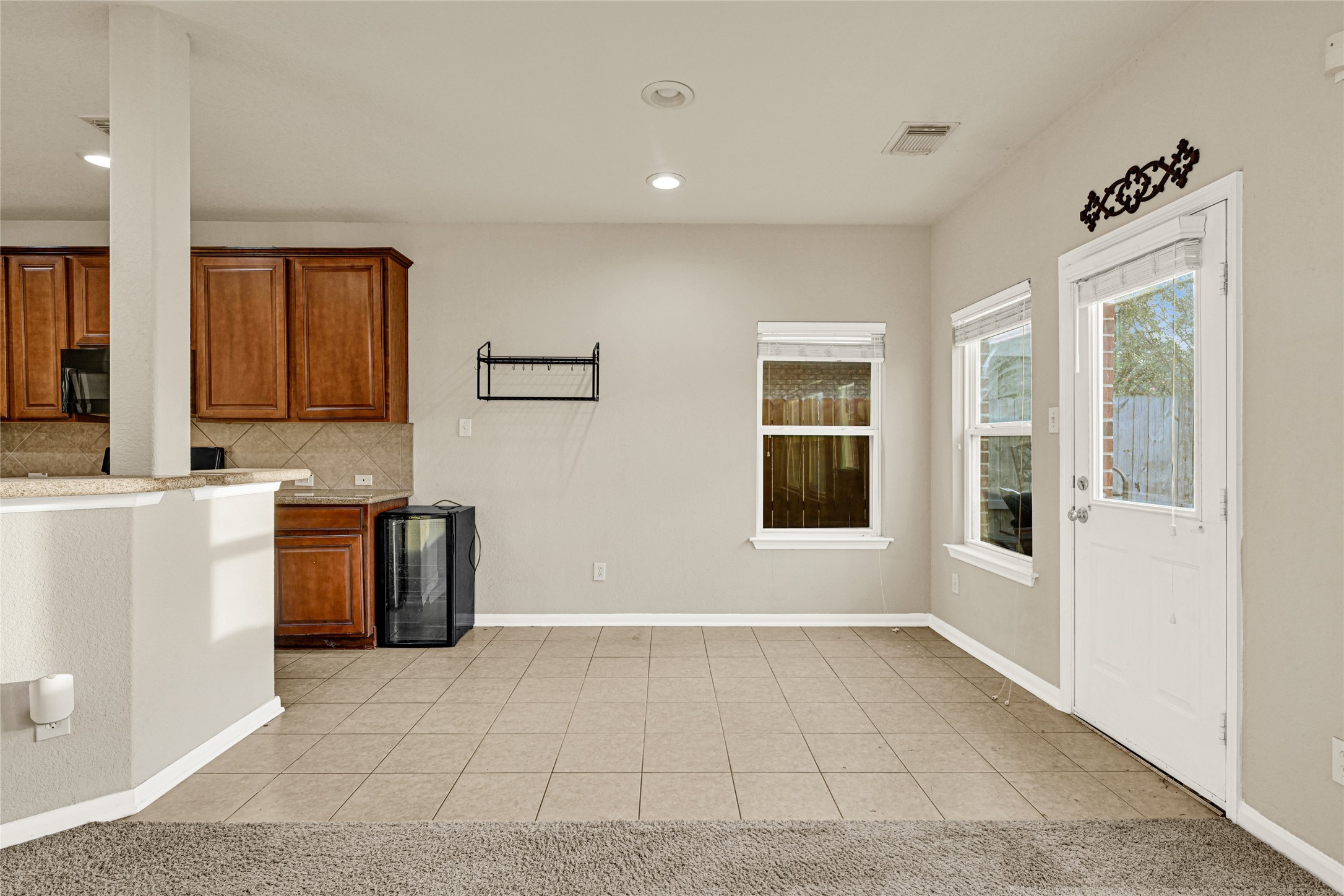 16415 Lapis River Drive Spring, TX 77379 - Photo 6 of 20 a view of kitchen with granite countertop cabinets and window