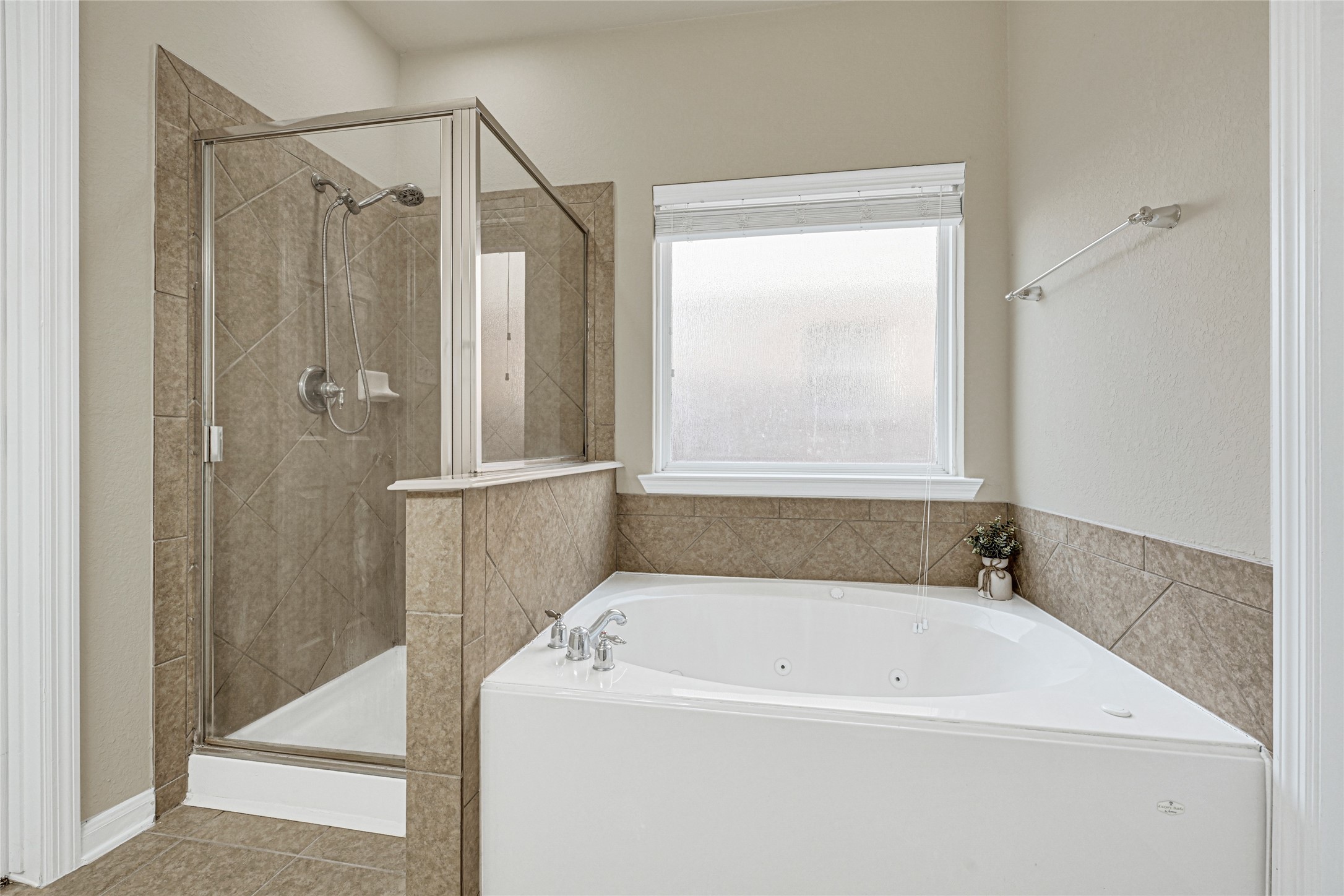 16415 Lapis River Drive Spring, TX 77379 - Photo 9 of 20 a white bath tub sitting next to a shower