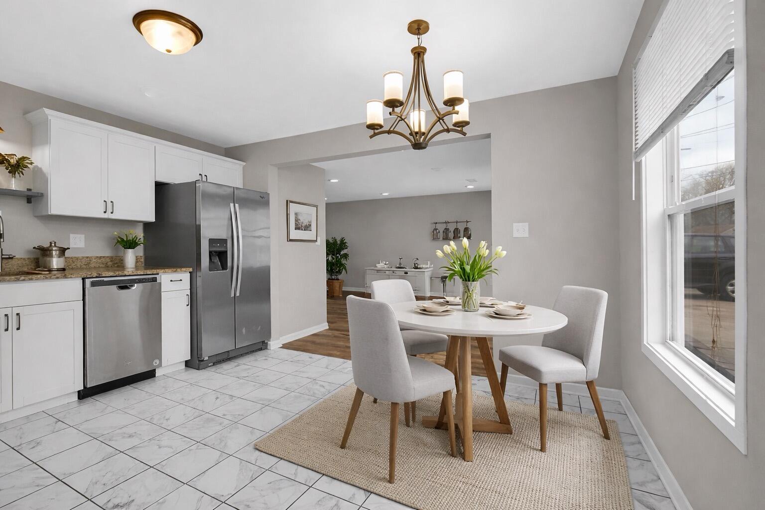 309 Michigami Trail Porter, IN 46304 - Photo 12 of 28 a view of a dining room with furniture and a chandelier
