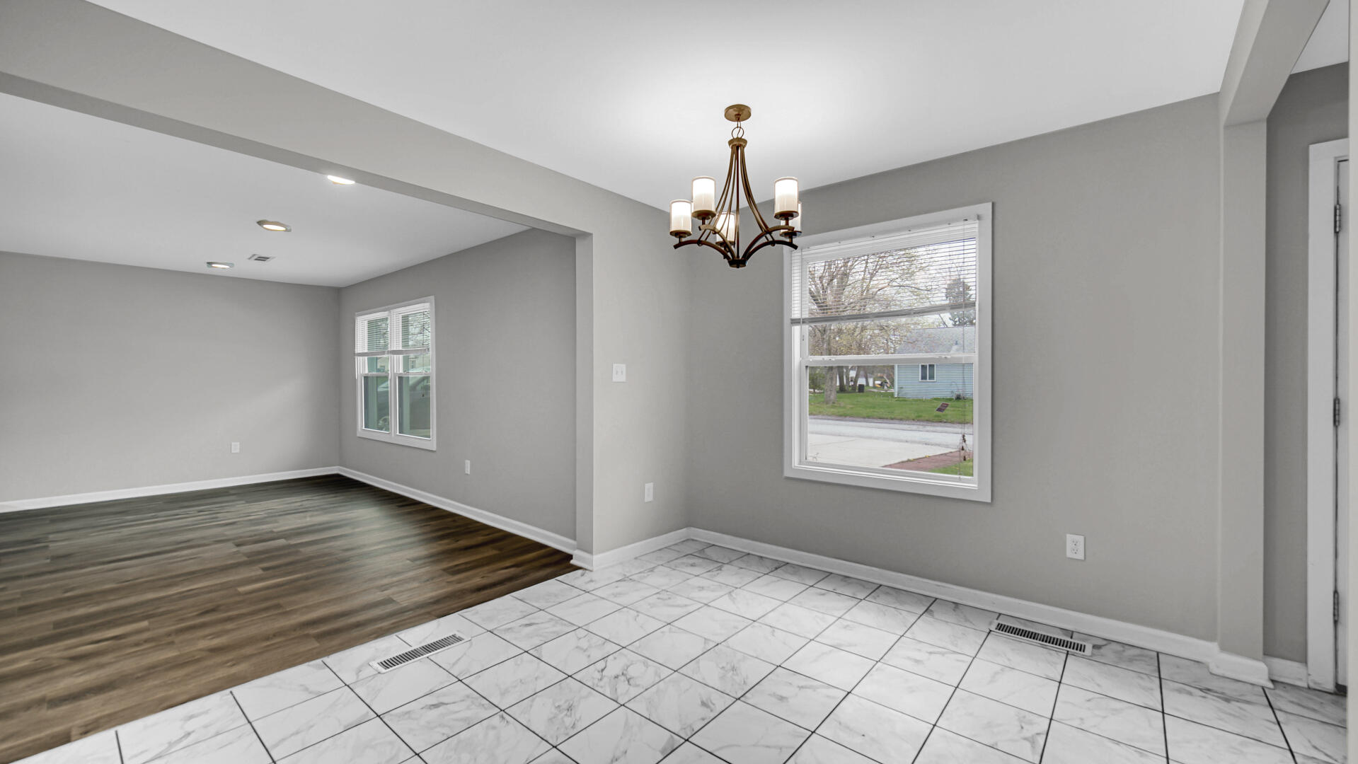 309 Michigami Trail Porter, IN 46304 - Photo 16 of 28 wooden floor in an empty room with a window