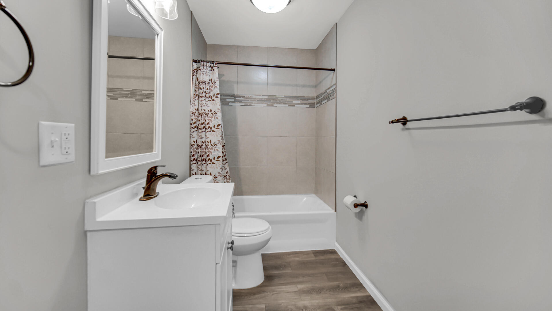 309 Michigami Trail Porter, IN 46304 - Photo 25 of 28 a bathroom with a sink a toilet and shower