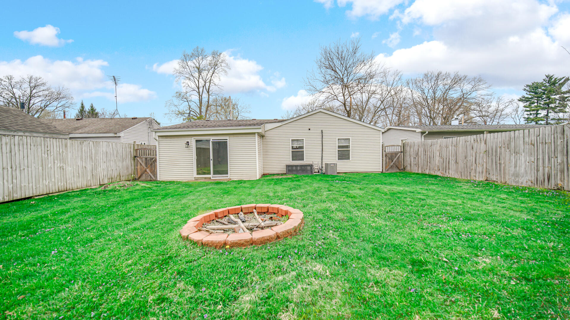 309 Michigami Trail Porter, IN 46304 - Photo 27 of 28 a view of a house with a backyard