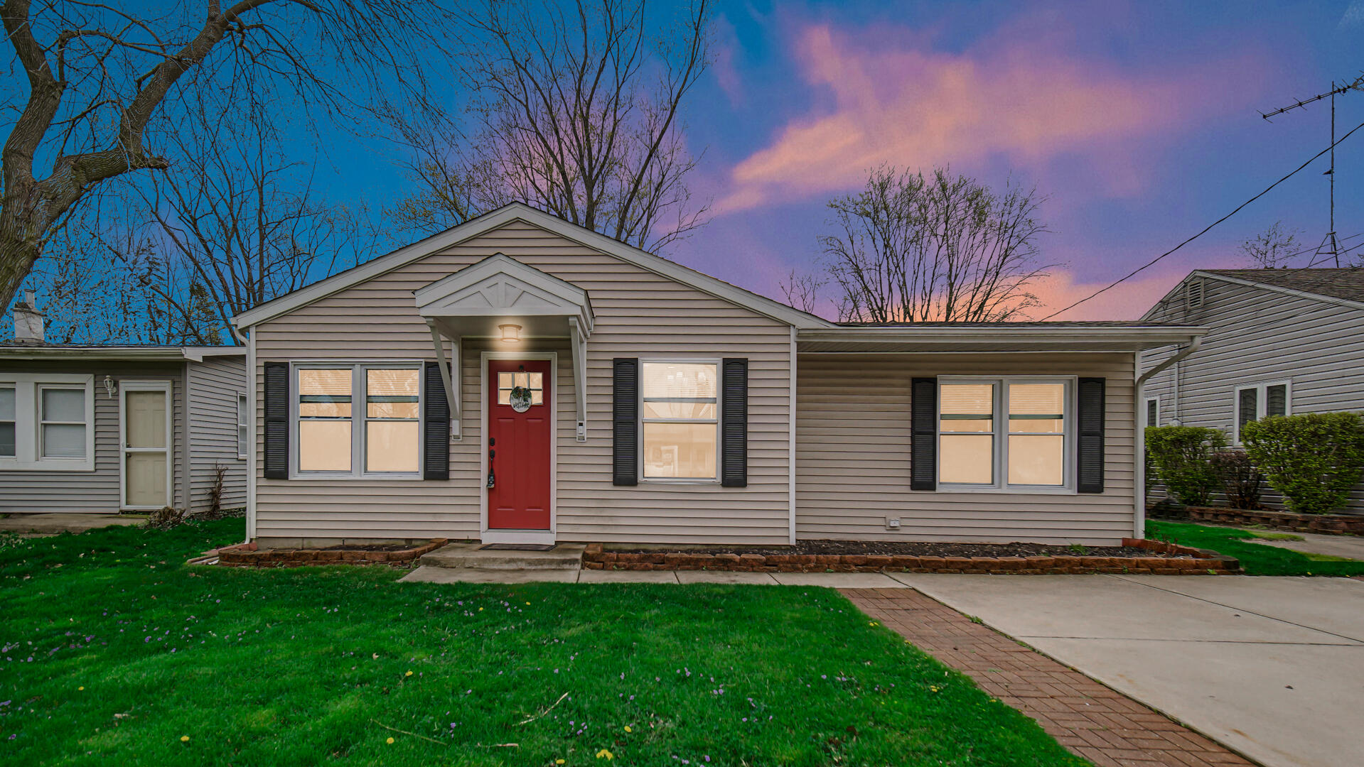 309 Michigami Trail Porter, IN 46304 - Photo 28 of 28 a front view of a house with a yard