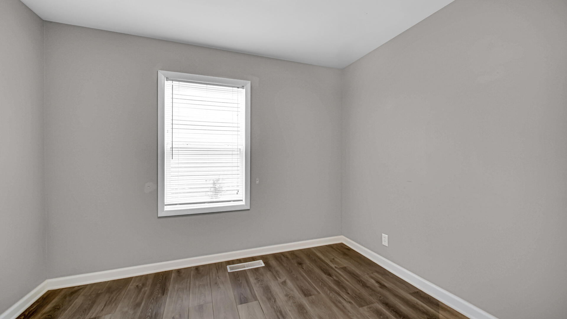 309 Michigami Trail Porter, IN 46304 - Photo 8 of 28 a view of a room with wooden floor and a window