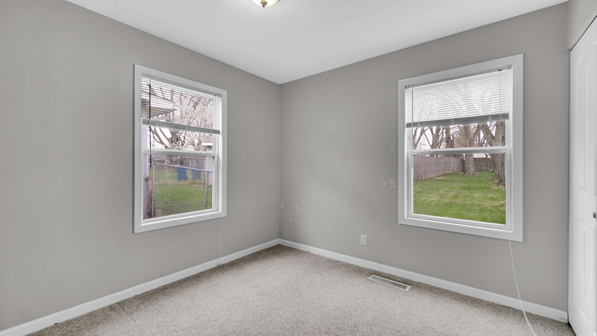 309 Michigami Trail Porter, IN 46304 - Photo 9 of 28 an empty room with windows