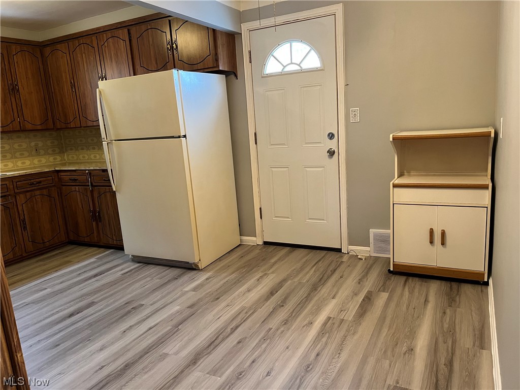 13101 Rockside Road Garfield Heights, OH 44125 - Photo 10 of 34 Brand New Flooring in the Kitchen