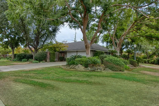 a view of a house with a big yard