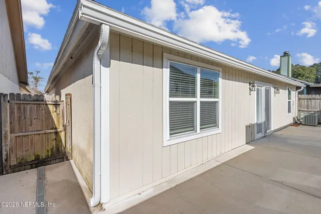 a view of house with wooden floor and stairs