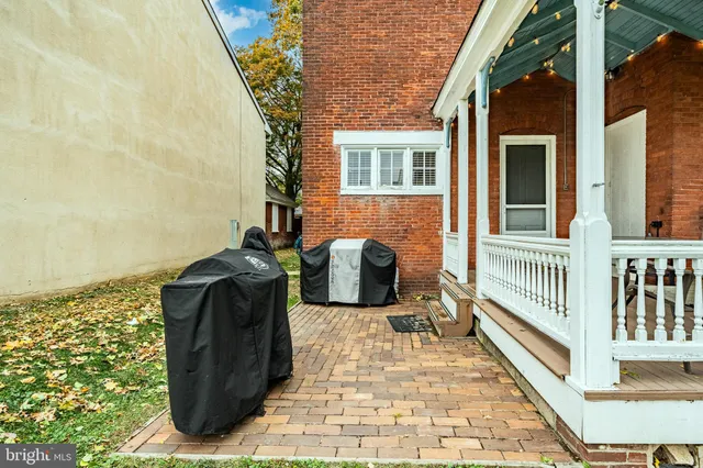 a view of a porch with furniture