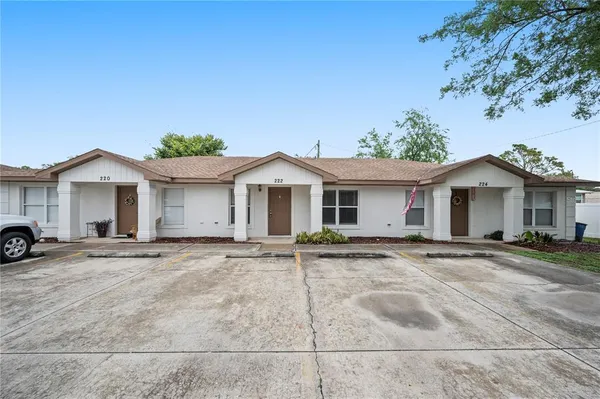 a view of front a house with a patio