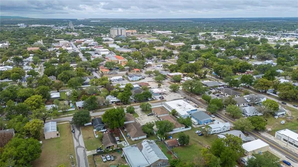 an aerial view of a house with a garden
