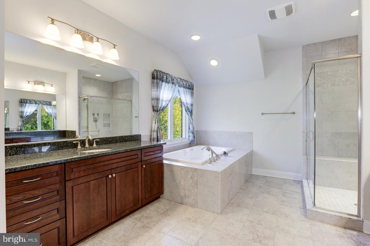 9600 Thistle Ridge Lane Vienna, VA 22182 - Photo 32 of 69 Owner's Suite Bath - Spa Tub